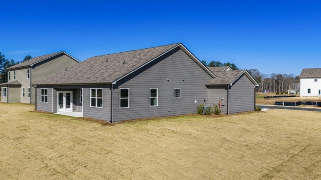 Exterior details and patio area of a home in Fairway 17 at Mirror Lake, Villa Rica (Image 4).