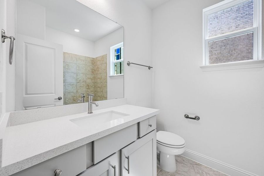 Representative furnished interior of a home built from the Camelia by Taylor Morrison in Stoneridge, Melissa (Image 13).