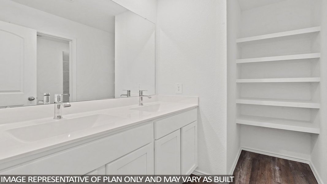 Furnished interior view inside a new home in Sunterra, Katy (Image 10).