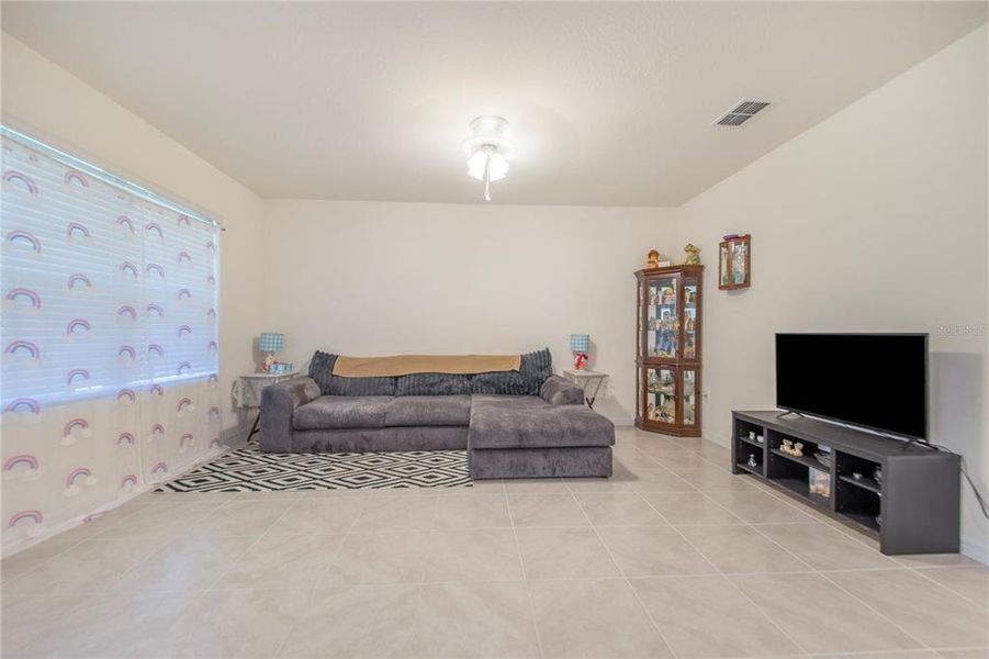 Furnished interior view inside a new home in Bradbury Creek, Haines City (Image 5).