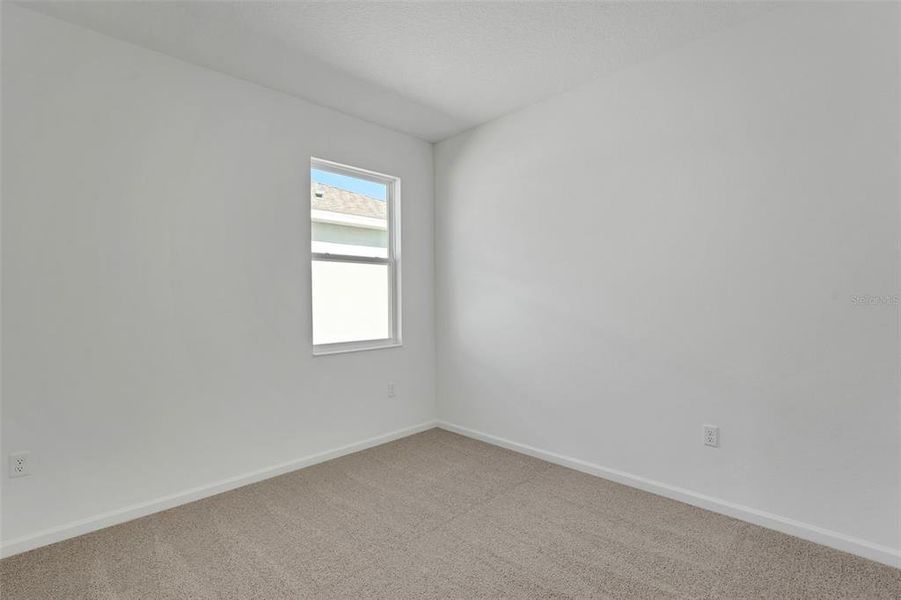 Spacious, unfurnished interior of a new home in Willowbrook North, Winter Haven (Image 23).