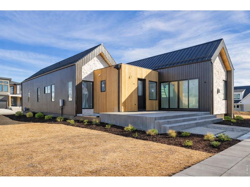 Front exterior of a new home in , Superior, CO, highlighting curb appeal (Image 6).