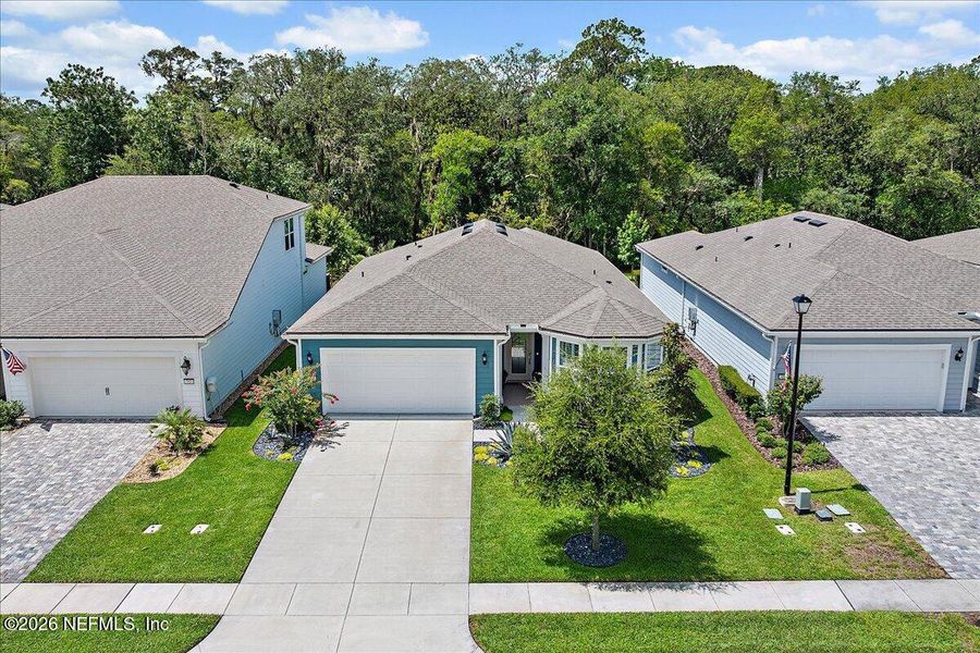 Front exterior of a new home in , Ponte Vedra, FL, highlighting curb appeal (Image 20).