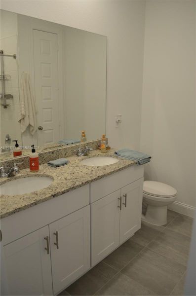 Furnished interior view inside a new home in , Port St. Lucie (Image 17).