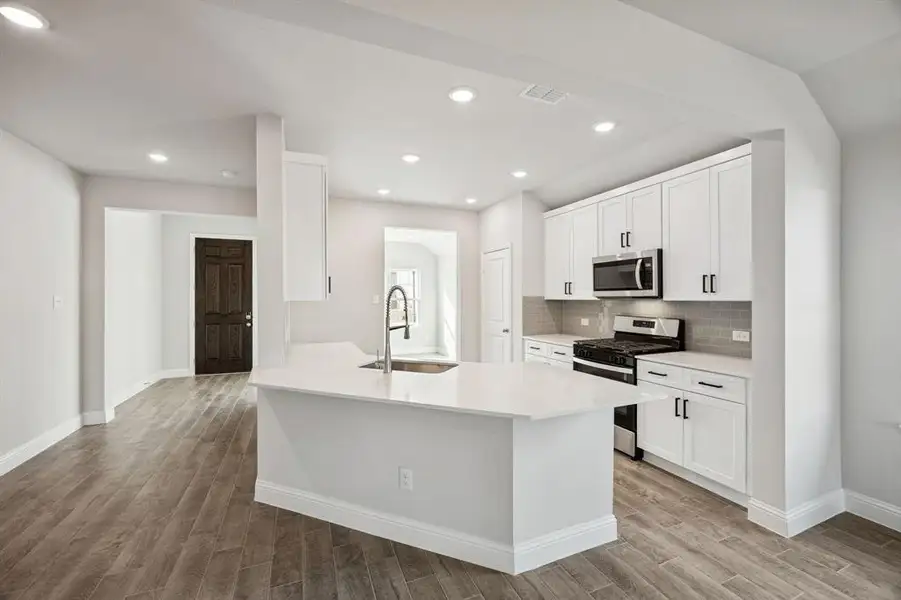 Furnished interior view inside a new home in Venetian, Weston (Image 8).