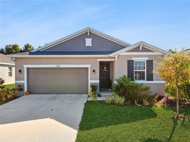 Front exterior of a new home in , Winter Haven, FL, highlighting curb appeal (Image 16).