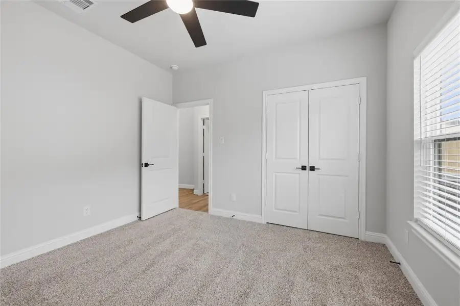 Spacious, unfurnished interior of a new home in Spring Branch Crossing, Conroe (Image 7). Spacious, unfurnished interior of a new home in Spring Branch Crossing, Conroe (Image 7).