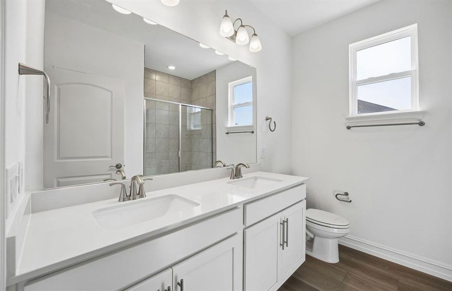 Secondary bathroom with double vanity