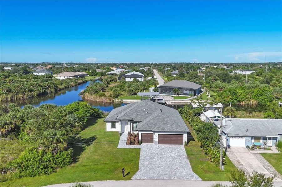 Front exterior of a new home in , Port Charlotte, FL, highlighting curb appeal (Image 21).