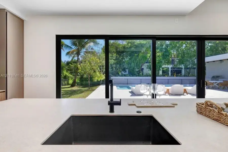 Exterior details and patio area of a home in , Pinecrest (Image 2). Exterior details and patio area of a home in , Pinecrest (Image 2).