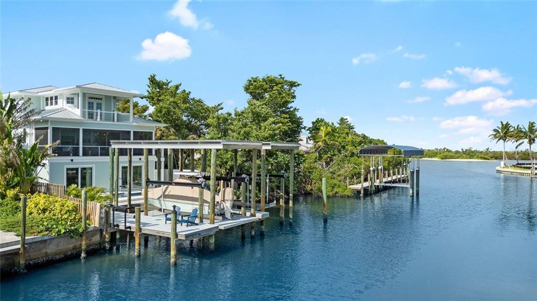 Front exterior of a new home in , Boca Grande, FL, highlighting curb appeal (Image 22). Front exterior of a new home in , Boca Grande, FL, highlighting curb appeal (Image 22).