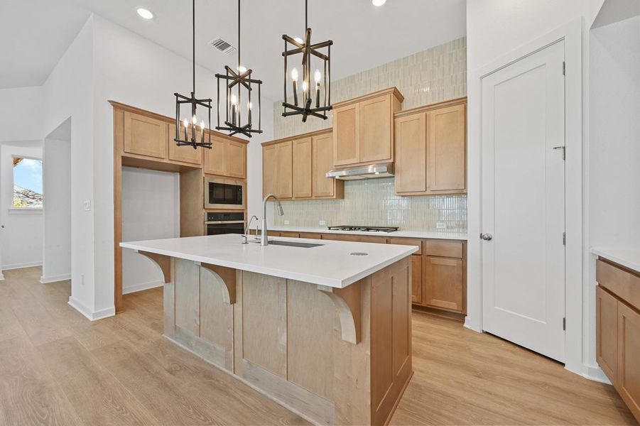 Furnished interior view inside a new home in 6 Creeks at Waterridge, Kyle (Image 6).