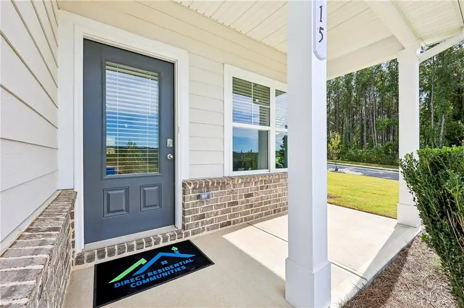Exterior details and patio area of a home in The Hills at Cedar Creek, Winder (Image 3).