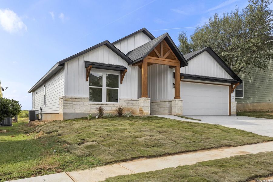 Front exterior of a new home in , Floresville, TX, highlighting curb appeal (Image 2). Front exterior of a new home in , Floresville, TX, highlighting curb appeal (Image 2).