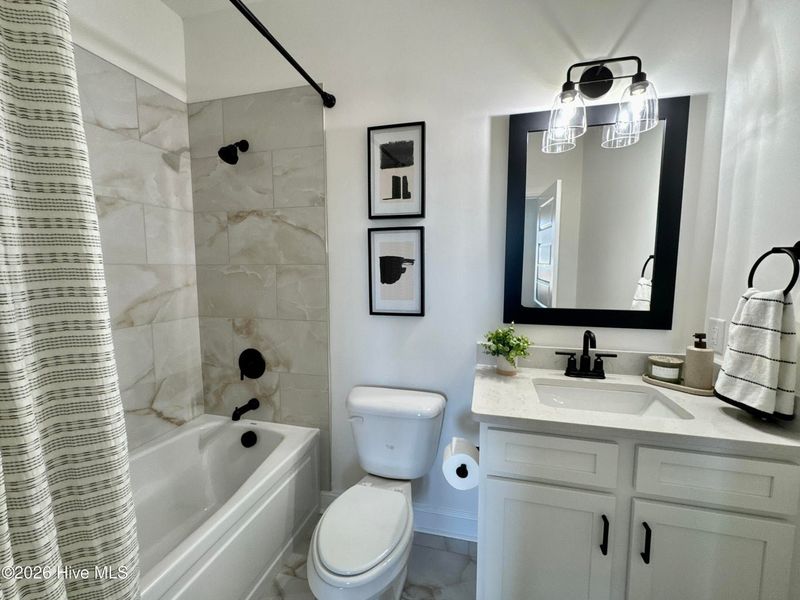 Furnished interior view inside a new home in Dixon Grove, Grimesland (Image 16).