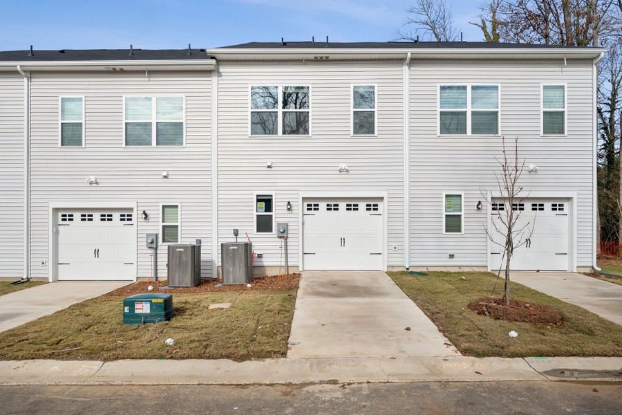 Exterior details and patio area of a home in Lakeview Village, Charlotte (Image 2). Exterior details and patio area of a home in Lakeview Village, Charlotte (Image 2).
