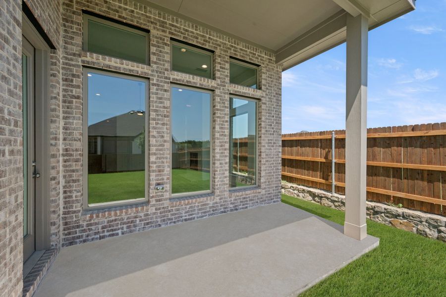 Exterior details and patio area of a home in Redden Farms, Midlothian (Image 20).
