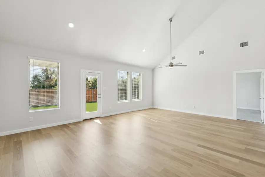 Living and Dining Rooms in the Winters home plan by Trophy Signature Homes – REPRESENTATIVE PHOTO
