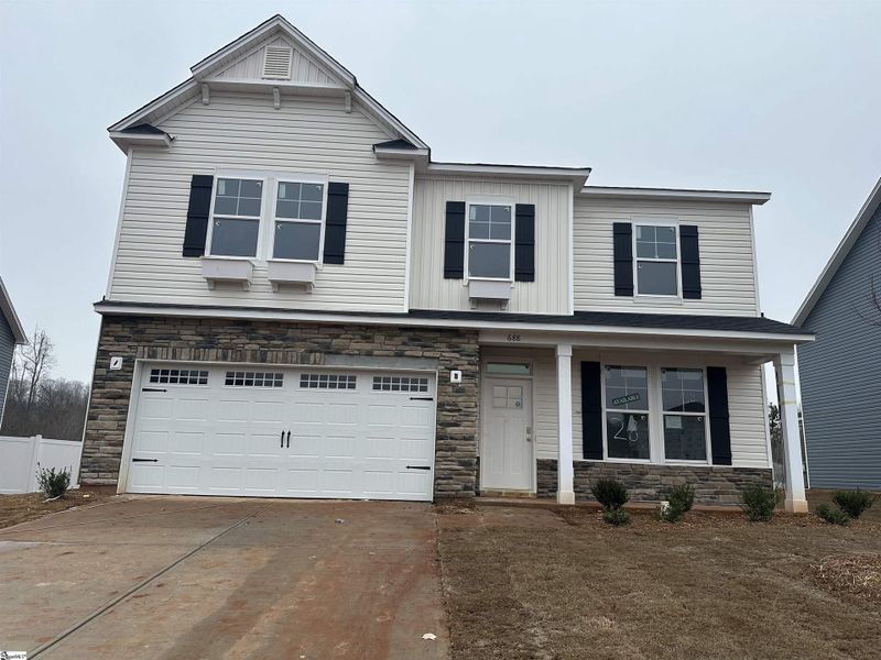 Front exterior of a new home in Shiloh Trail, Wellford, SC, highlighting curb appeal (Image 1). Front exterior of a new home in Shiloh Trail, Wellford, SC, highlighting curb appeal (Image 1).