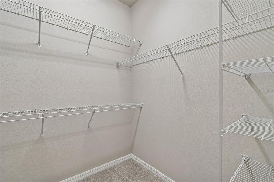 Spacious, unfurnished interior of a new home in Laureate Park at Lake Nona - Garden Series, Orlando (Image 22).