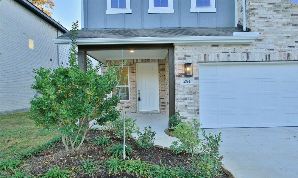 Exterior details and patio area of a home in The Woodlands Hills, Willis (Image 20).