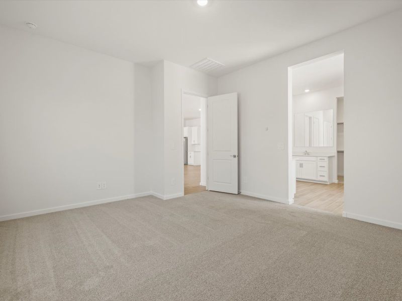 Spacious, unfurnished interior of a new home in White Tank Foothills Signature Series, Waddell (Image 11).