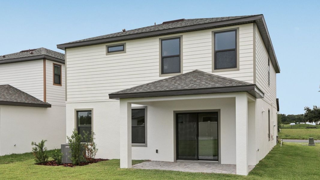 Representative exterior photo of a completed home built from the Ponte Vedra by DRB Homes in Grasslands West, Lakeland, FL (Image 27).