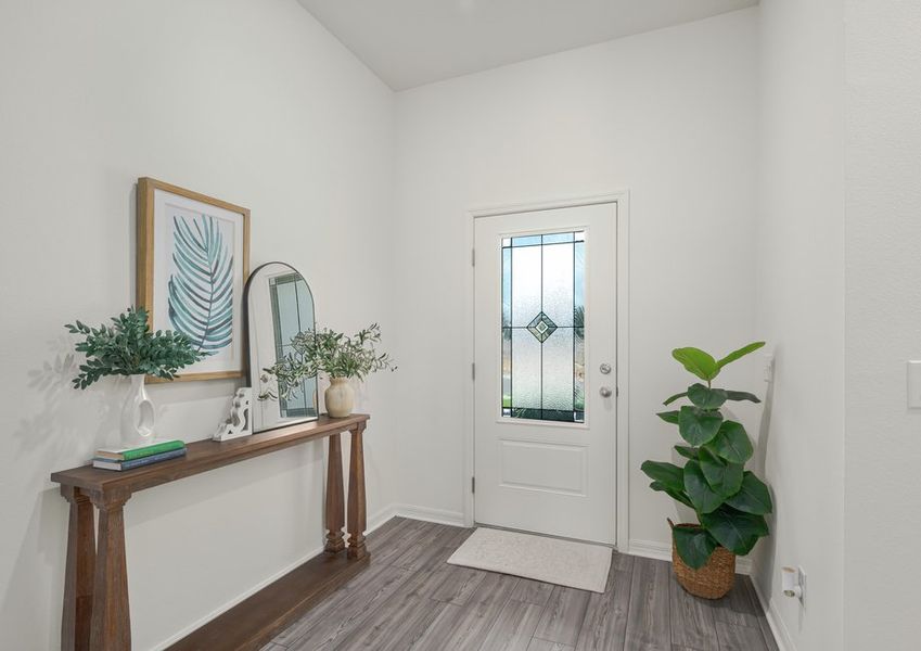 The entryway features this gorgeous 3/4 lite door!