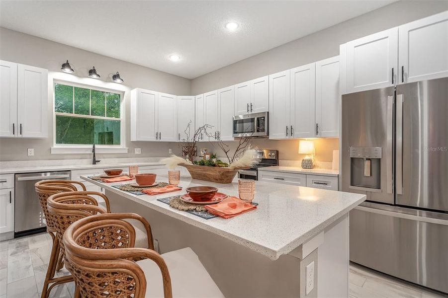 PHOTO OF MODEL HOME - SAME FLOOR PLAN ASIDE FROM LAUNDRY ROOM