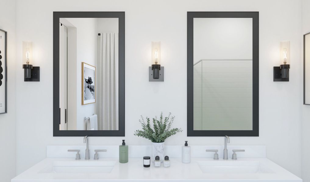 Thick black mirrors and chrome fixtures throughout primary bath