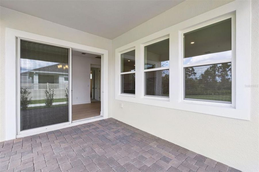 Exterior details and patio area of a home in Northlake At Ovation, Winter Garden (Image 3).
