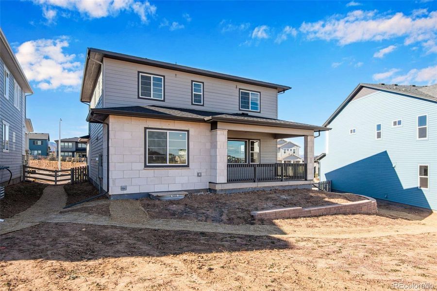 Exterior details and patio area of a home in Prelude at Sterling Ranch, Littleton (Image 4).
