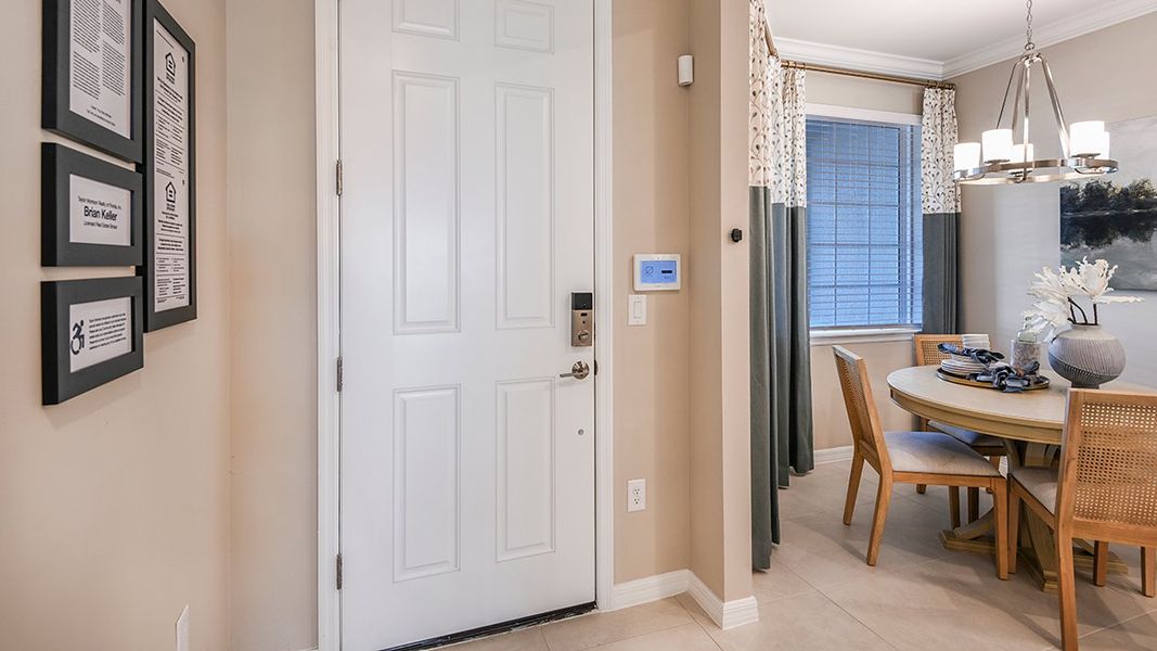 Representative furnished interior of a home built from the Avanti VII by Taylor Morrison in Esplanade Lake Club Condos, Fort Myers (Image 6).