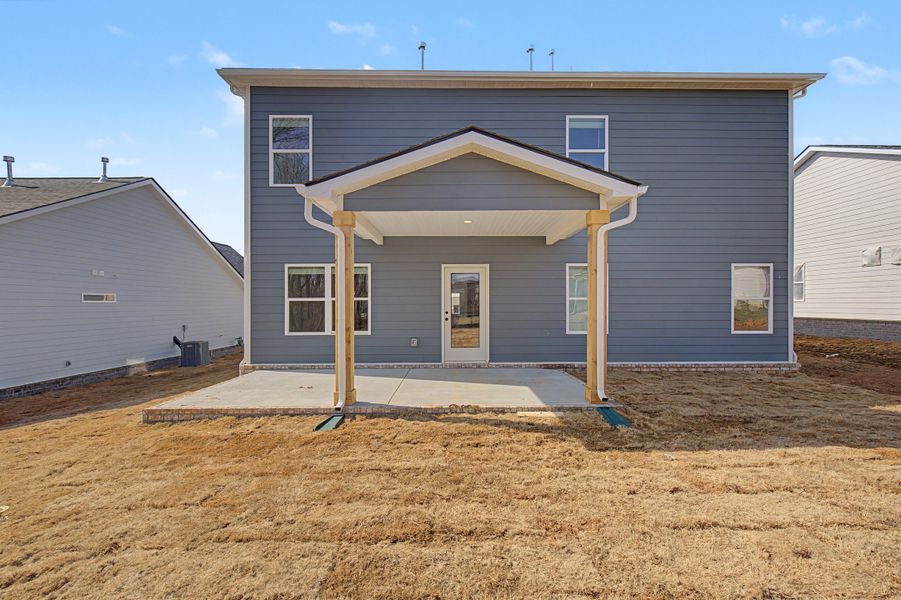 Exterior details and patio area of a home in The Oaks, Clarksville (Image 4).