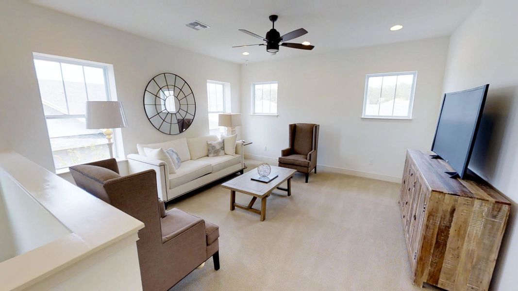 Representative furnished interior of a home built from the Emory by Ashton Woods in Weslyn Park Single Family, St. Cloud (Image 7).