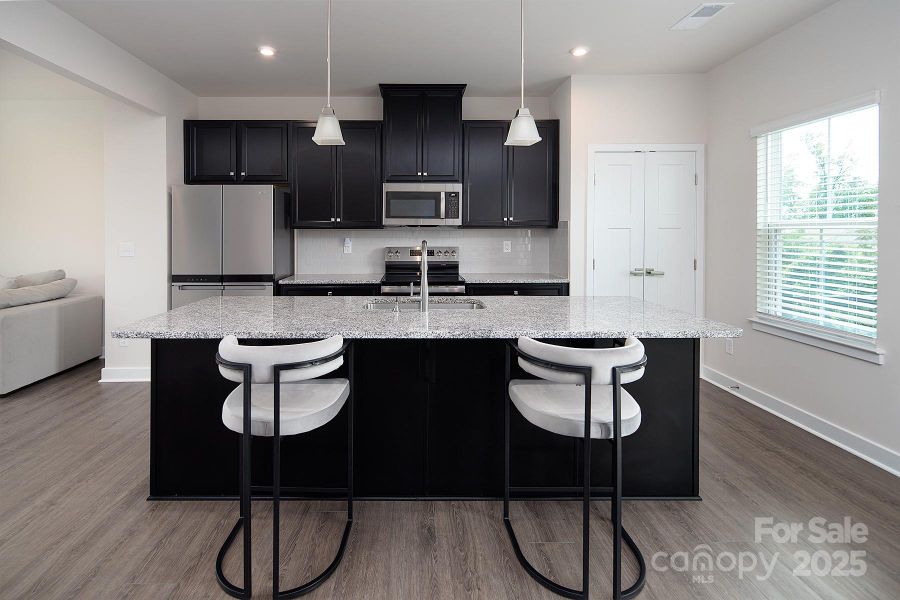 Furnished interior view inside a new home in , Huntersville (Image 5).