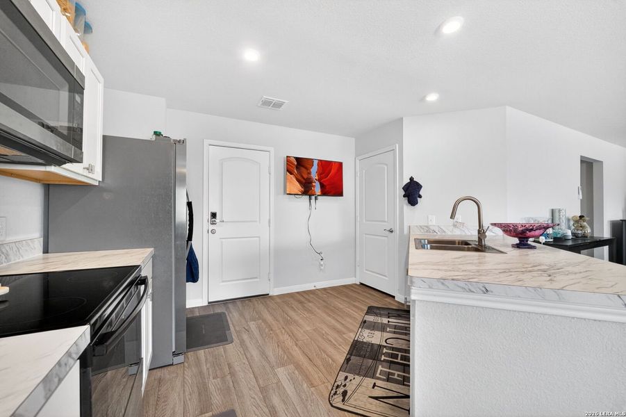 Furnished interior view inside a new home in Mission Del Lago, San Antonio (Image 10).