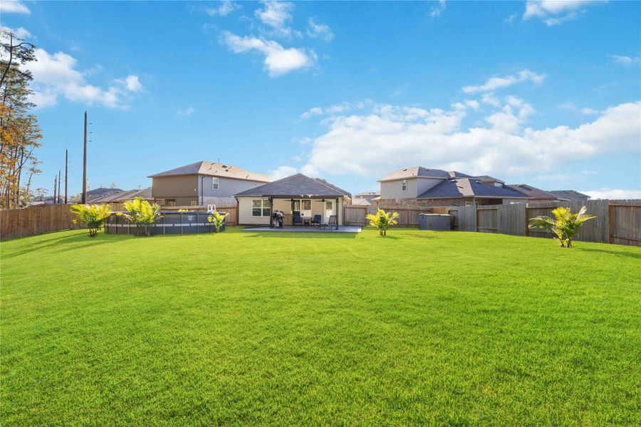 Expansive Backyard – Wide Lot ViewRare oversized backyard offering endless possibilities for outdoor living and enjoyment. With ample green space, this yard is ideal for entertaining, play, pets, or creating a private garden retreat. The fully fenced layout provides privacy, while the large lot easily accommodates future enhancements such as additional landscaping, play areas, or outdoor features. A true outdoor oasis with room to make it your own. Expansive Backyard – Wide Lot ViewRare oversized backyard offering endless possibilities for outdoor living and enjoyment. With ample green space, this yard is ideal for entertaining, play, pets, or creating a private garden retreat. The fully fenced layout provides privacy, while the large lot easily accommodates future enhancements such as additional landscaping, play areas, or outdoor features. A true outdoor oasis with room to make it your own.