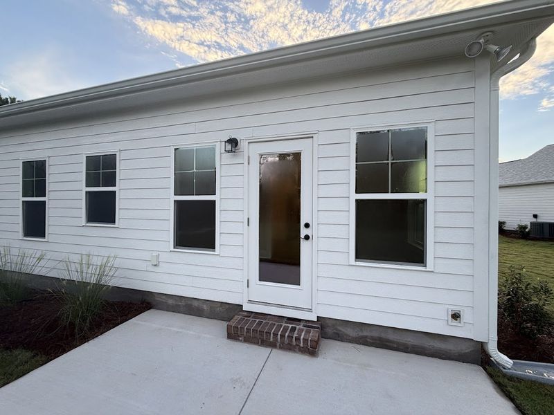 Exterior details and patio area of a home in Songbird, Hampstead (Image 26). Exterior details and patio area of a home in Songbird, Hampstead (Image 26).
