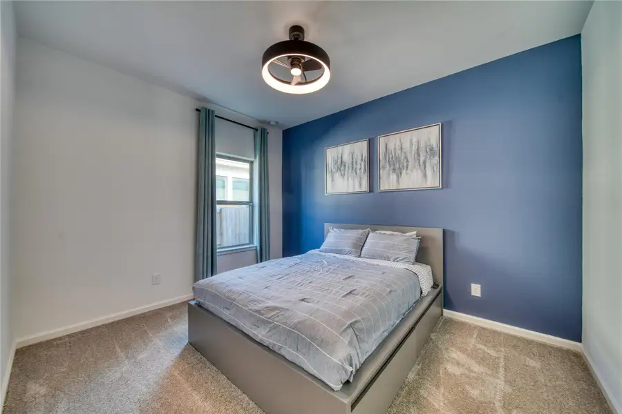 Furnished interior view inside a new home in Meridiana 40'/45', Manvel (Image 14).