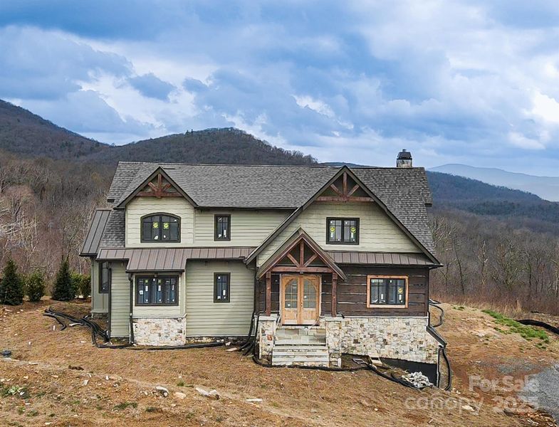 Front exterior of a new home in , Hendersonville, NC, highlighting curb appeal (Image 9).
