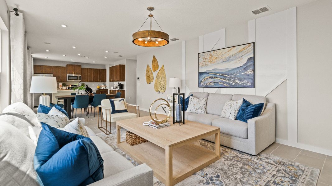 The First Floor Living Area in the Model Highbourne by DRB Homes in Hamilton Bluff located in Haines City, FL. The First Floor Living Area in the Model Highbourne by DRB Homes in Hamilton Bluff located in Haines City, FL.