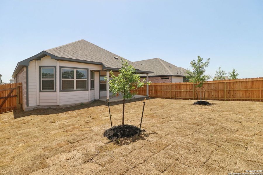 Front exterior of a new home in Arcadia Ridge - Premier Series, San Antonio, TX, highlighting curb appeal (Image 22). Front exterior of a new home in Arcadia Ridge - Premier Series, San Antonio, TX, highlighting curb appeal (Image 22).