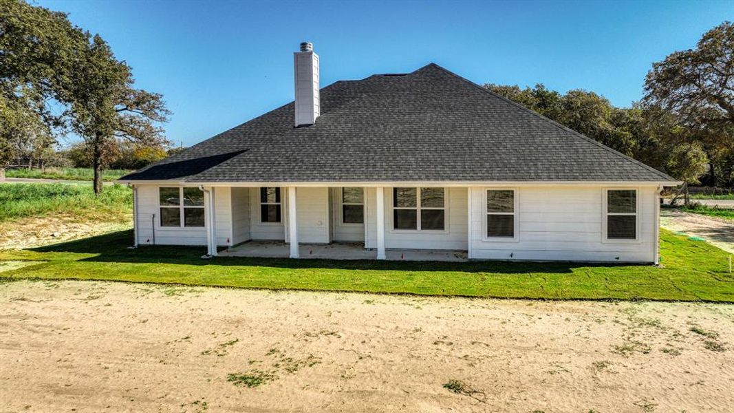 Exterior details and patio area of a home in , Poolville (Image 4).