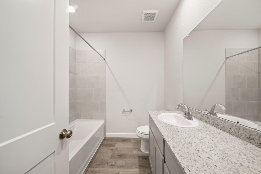 Furnished interior view inside a new home in Lexington Heights, Willis (Image 10).