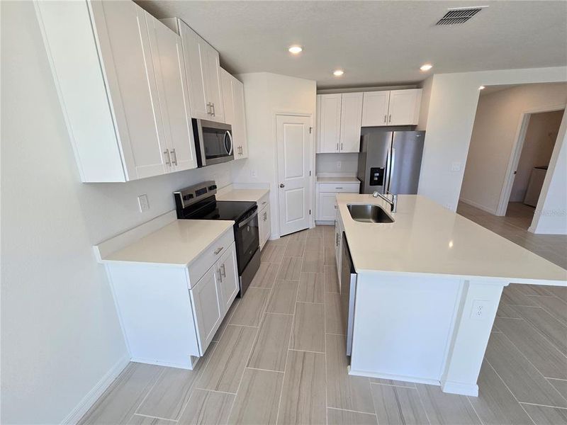 Furnished interior view inside a new home in Magnolia Bay - Classic Series, Nokomis (Image 5).