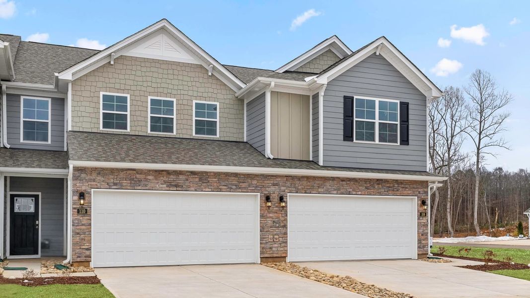 Front exterior of a new home in Lybrook Village, Advance, NC, highlighting curb appeal (Image 13).