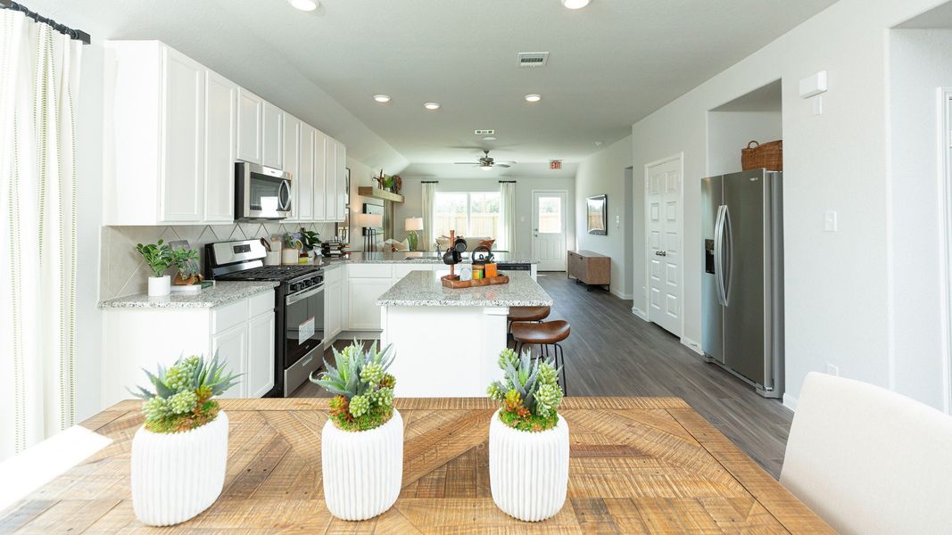 Representative furnished interior of a home built from the The Ravenna by Legend Homes in Granger Pines, Conroe (Image 5).