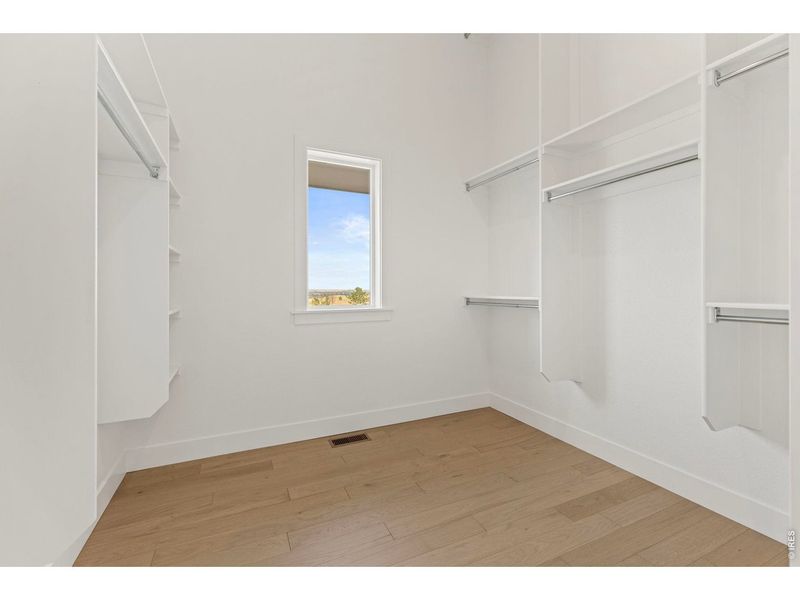 Spacious, unfurnished interior of a new home in RainDance, Windsor (Image 18).