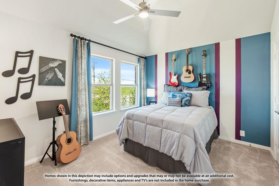 Bedroom with music-themed decor, blue and purple striped accent wall, guitars displayed, and ceiling fan Bedroom with music-themed decor, blue and purple striped accent wall, guitars displayed, and ceiling fan